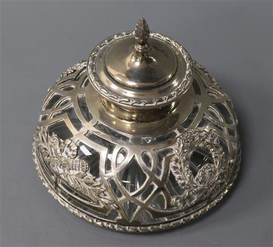 A circular cut glass silver-mounted inkwell,